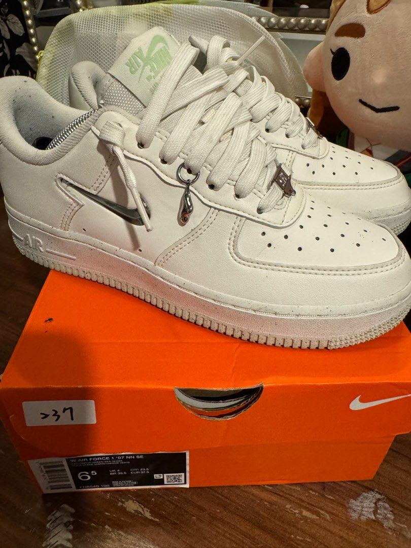 Nike air force silver charm (Category: Sneakers) located in Pasig City. Submitted by helpmedispose (Listing ID 1392060178, Image 2). Description: .