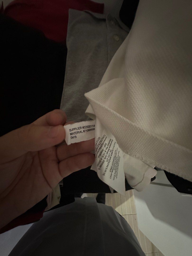 Ralph Lauren White Blue Pony (Category: Tshirts & Polo Shirts ) located in Rizal. Submitted by declutter_with_d (Listing ID 1391957844, Image 2). Description: RL White with Blue Pony 19x26 dimes minor issue: super small hole under the collar In pristine condition.