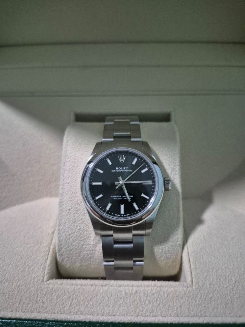 Rolex Oyster Perpetual 31 Black Dial 277200 (Category: Watches) located in Singapore. Submitted by random_fellow (Listing ID 1391966463, Image 2). Description: Rolex Oyster Perpetual 31 Black dial 277200 Full set.