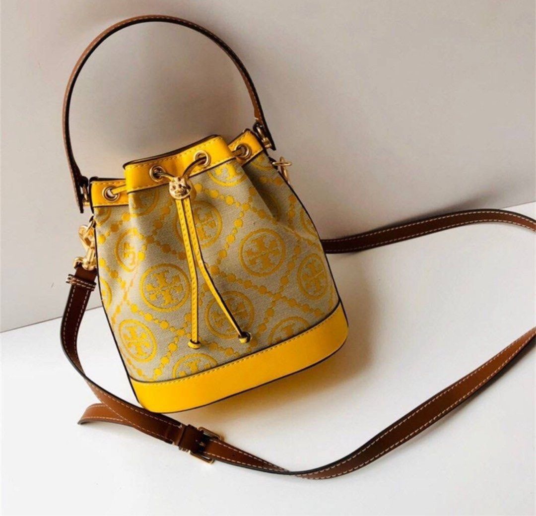 Yellow Tory Burch Monogram Jacquard Bucket Bag (Category: Cross-body Bags) located in Bulacan. Submitted by bggwn (Listing ID 1392064225, Image 1). Description: message me for the actual photos.