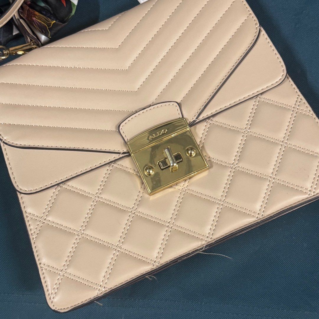 Aldo Beige Neutral Handbag Slingbag (Category: Cross-body Bags) located in Manila. Submitted by basicstuffmnl (Listing ID 1392229243, Image 2). Description: Like new. Used less than 5x only. Rfs: not using anymore. Decluttering stuff.