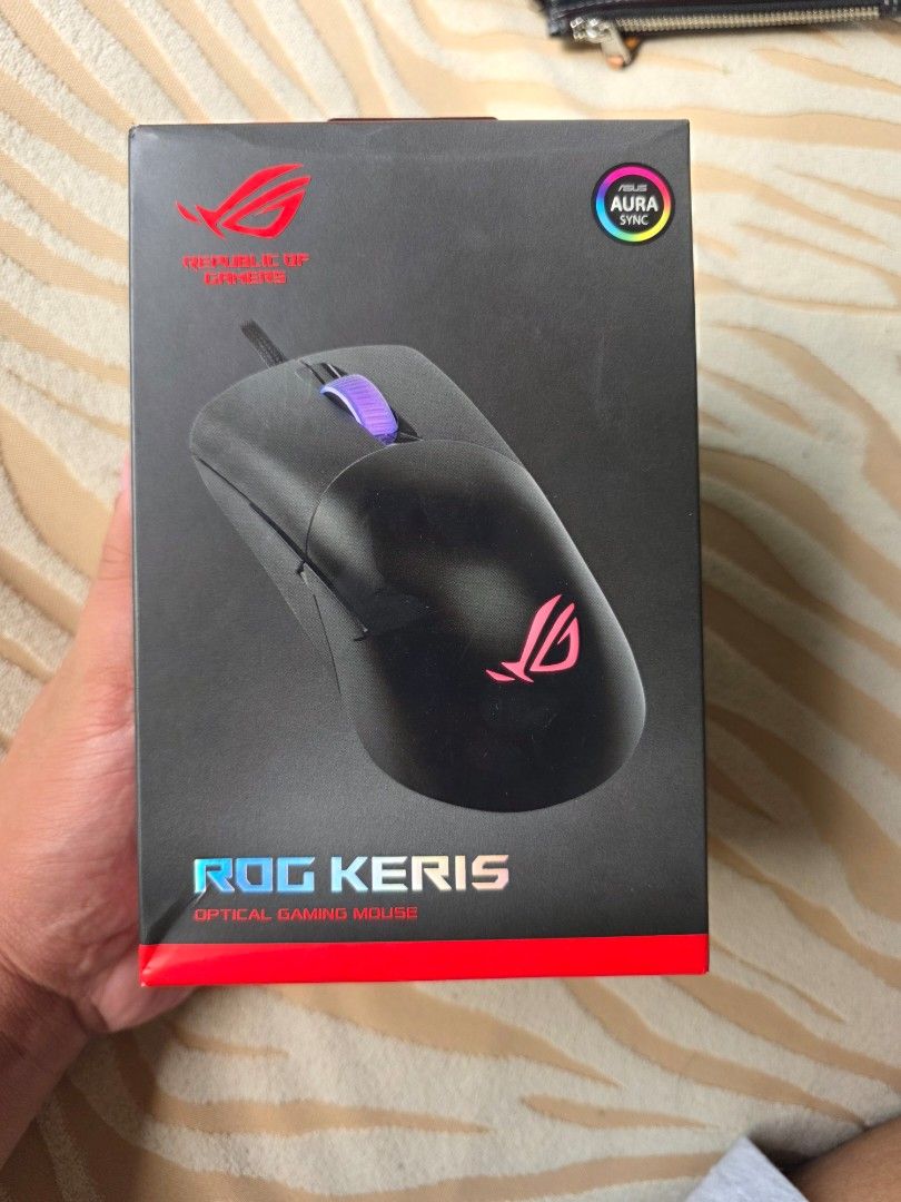 Asus ROG keri mouse (Category: Mouse & Mousepads) located in Las Pinas. Submitted by jhered (Listing ID 1392186384, Image 1). Description: Sale Brandnew Original Sealed Sale for 2800 Las pinas area.