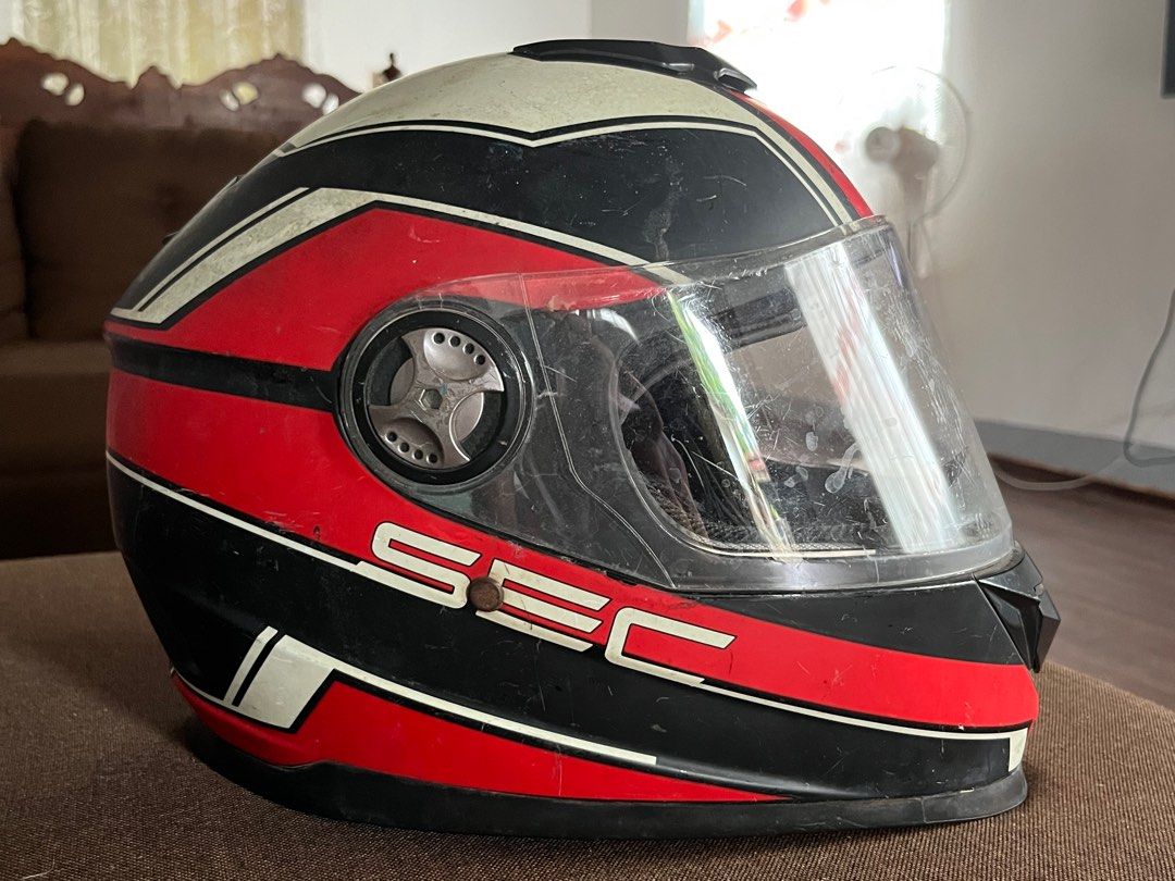 SEC & Motortrade Helmets (₱1K for both) (Category: Helmets and other Riding Gears) located in Mendez-Nunez. Submitted by keicart (Listing ID 1392187726, Image 3). Description: SEC Full Face Helmet - Bought for ₱3,500+ originally - Used less than a year, then stored - Still in good shape, visor has light scratches but no cracks on the shell, a little rusting on the buckles as well. - ICC certified Motortrade Helmet - Great as an extra/backride hel