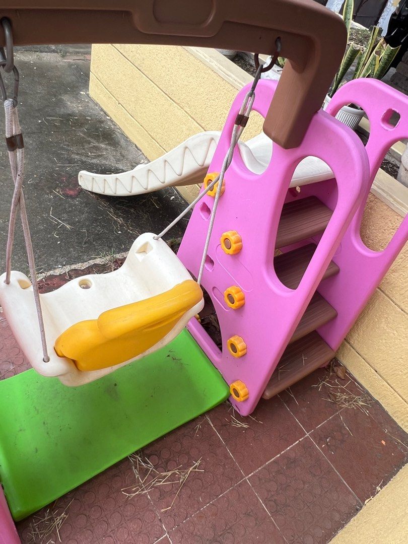 Kids slide&swing (Category: Infant Playtime) located in Las Pinas. Submitted by shen011 (Listing ID 1392167182, Image 3). Description: Outgrown Needs cleaning Rusting Buckle part but ok pa din sya Fading ng color on some parts Actual picture Can be pickup via lalamove (SUV).
