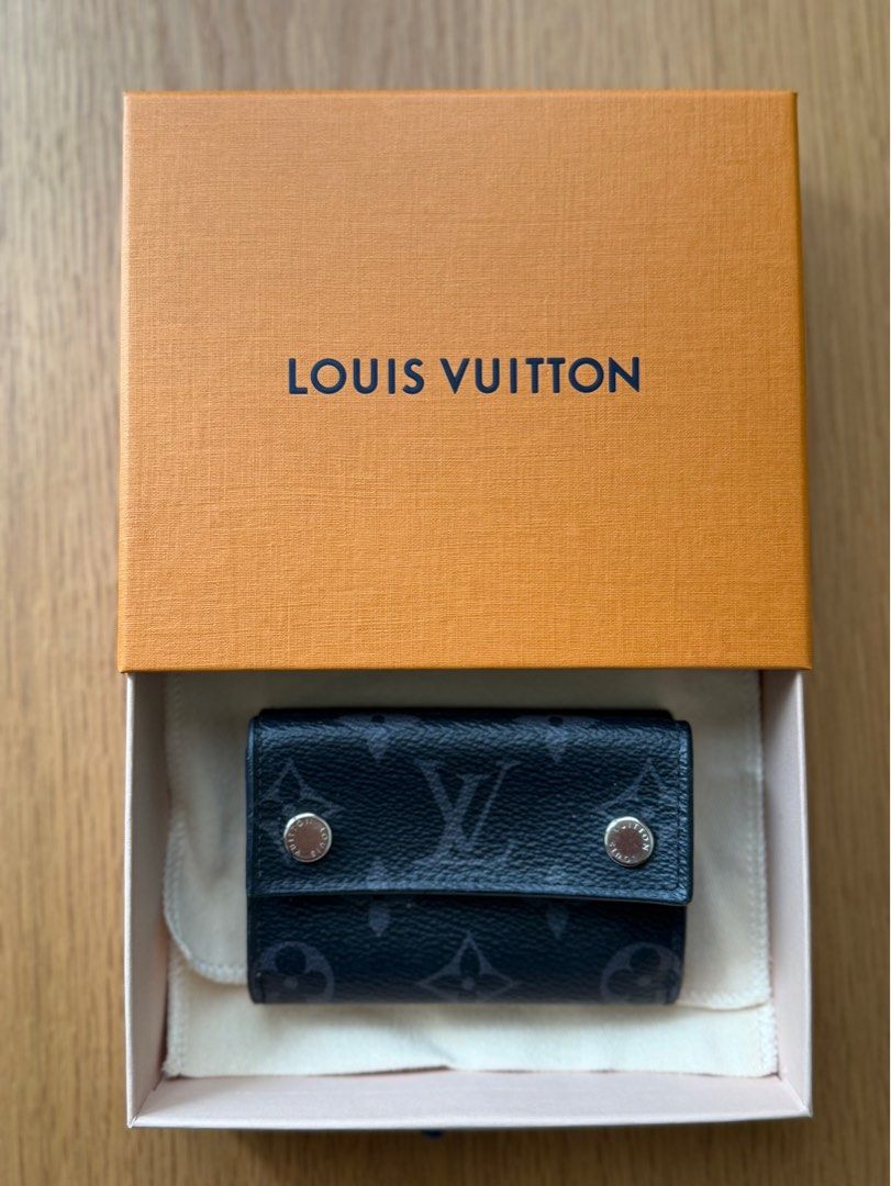 LOUIS VUITTON MONOGRAM ECLIPSE DISCOVERY COMPACT WALLET (Category: Luxury Bags & Wallets) located in Manila. Submitted by lessismore_9x (Listing ID 1392141558, Image 3). Description: Louis Vuitton Discovery Compact Wallet in Monogram Eclipse. 100% authentic, comes complete with box, dust bag and paper bag. Rarely used and in pristine, like-new condition. A timeless luxury piece that combines elegance and practicality — perfect for collectors or t