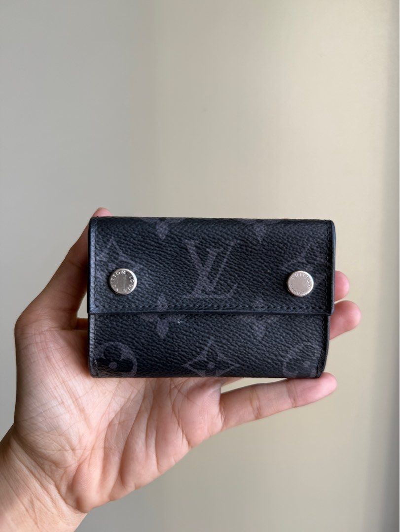 LOUIS VUITTON MONOGRAM ECLIPSE DISCOVERY COMPACT WALLET (Category: Luxury Bags & Wallets) located in Manila. Submitted by lessismore_9x (Listing ID 1392141558, Image 1). Description: Louis Vuitton Discovery Compact Wallet in Monogram Eclipse. 100% authentic, comes complete with box, dust bag and paper bag. Rarely used and in pristine, like-new condition. A timeless luxury piece that combines elegance and practicality — perfect for collectors or t
