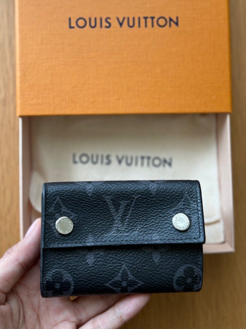 LOUIS VUITTON MONOGRAM ECLIPSE DISCOVERY COMPACT WALLET (Category: Luxury Bags & Wallets) located in Manila. Submitted by lessismore_9x (Listing ID 1392141558, Image 2). Description: Louis Vuitton Discovery Compact Wallet in Monogram Eclipse. 100% authentic, comes complete with box, dust bag and paper bag. Rarely used and in pristine, like-new condition. A timeless luxury piece that combines elegance and practicality — perfect for collectors or t