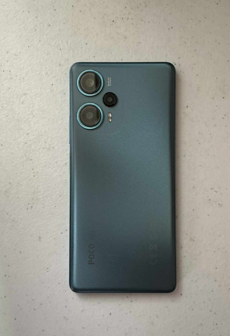 Poco F5 8/256 (Category: Android Others) located in Quezon City. Submitted by mquerubin564 (Listing ID 1392134594, Image 2). Description: Poco F5 8/256 (UNIT ONLY) Condition: 9/10 Inclusions: Original box, Jelly case Issue: Minor dents PRICE NEGOTIABLE‼️‼️‼️ Lalamove, Grabexpress, any other courier services should be shouldered by buyer..