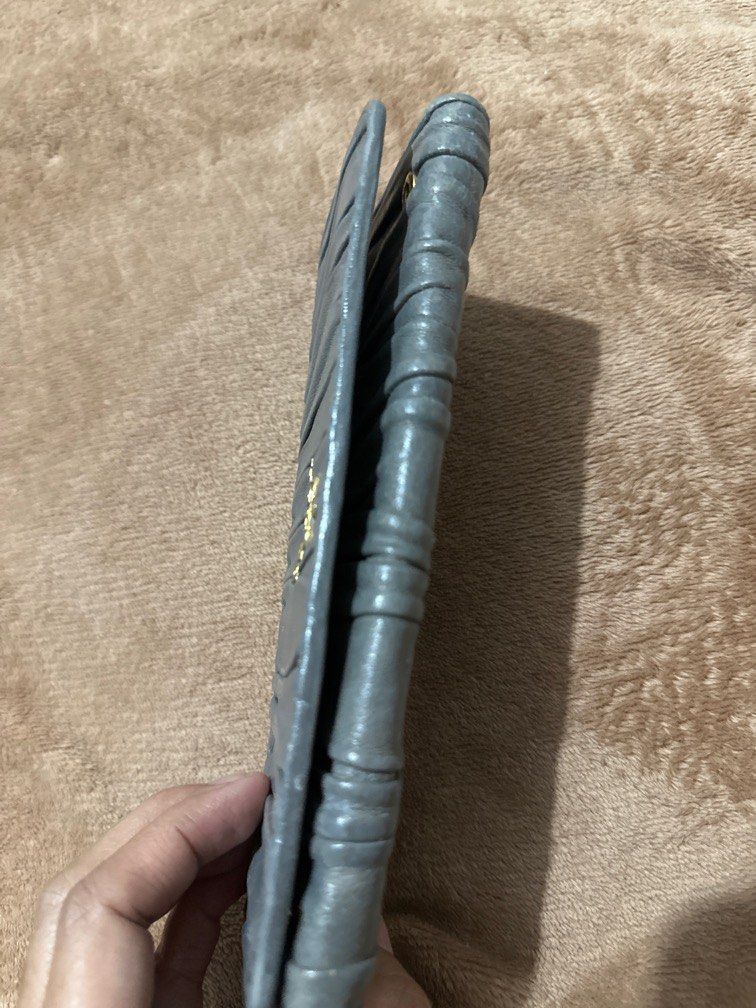 Prada long womens wallet (Category: Luxury Bags & Wallets) located in Marikina City. Submitted by purplestash28 (Listing ID 1392229655, Image 3). Description: authentic pre loved gray Prada soft leather long wallet .