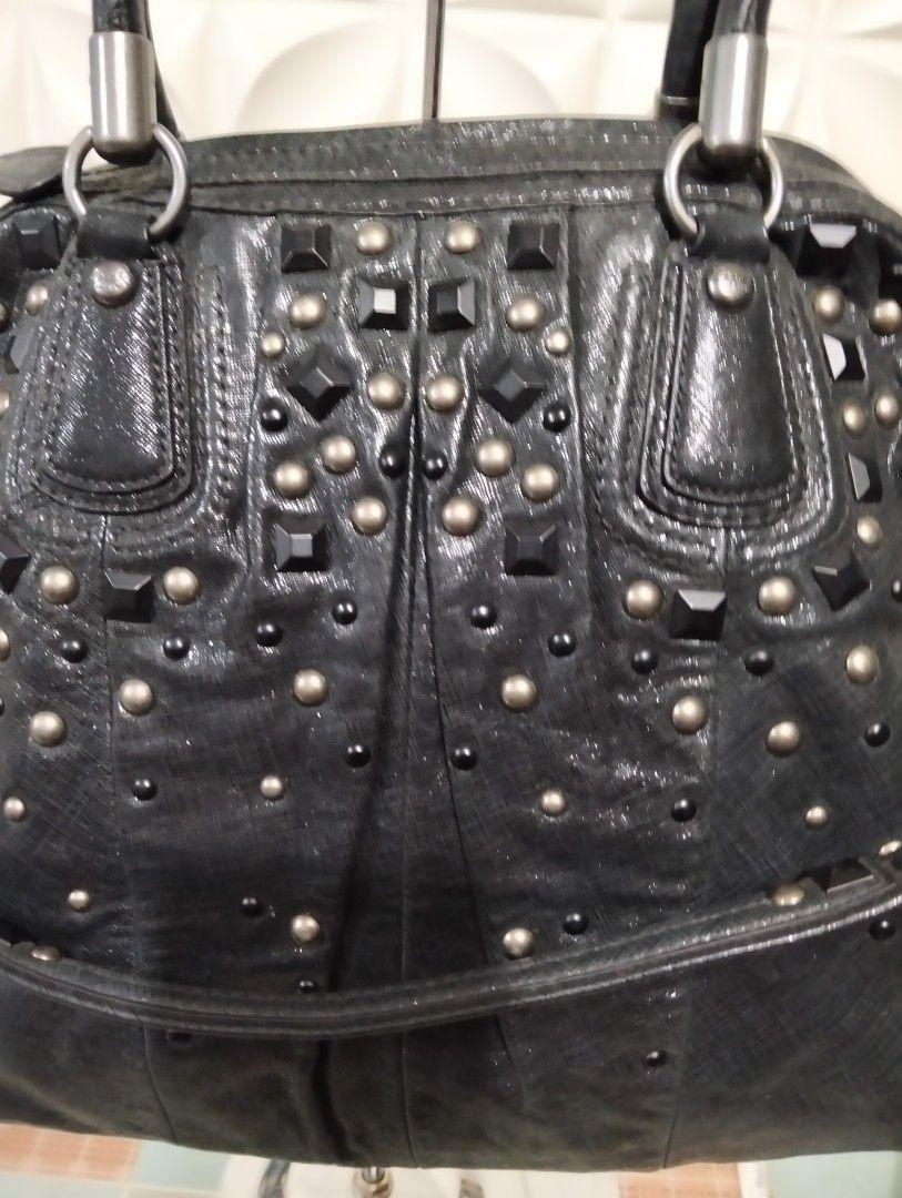 Rare , limited edition coach (Category: Luxury Bags & Wallets) located in Manila. Submitted by beabi041582 (Listing ID 1392261636, Image 2). Description: Kristin gun metal , rare collection ang gaganda ng studs at ang lalaki ng hardware malinis loob and labas 13 x 15.