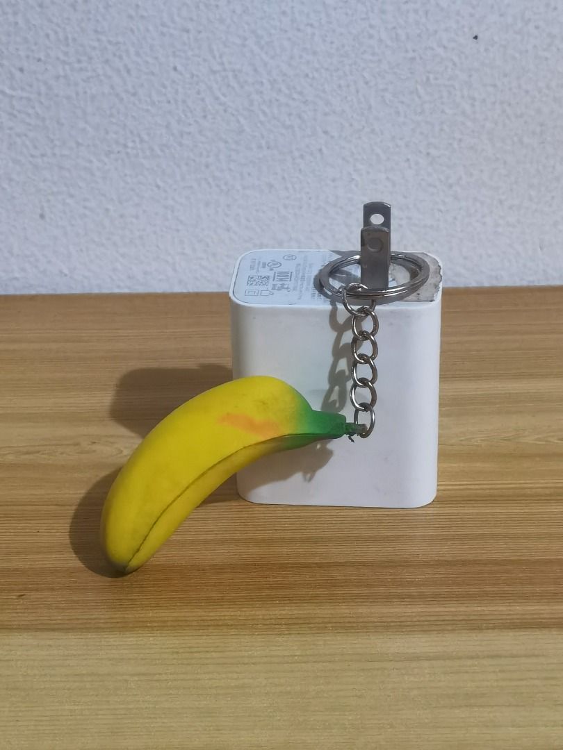 Squishy Banana Keychain (Category: Character Goods) located in Taguig. Submitted by kalabasza (Listing ID 1392300836, Image 2). Description: 📌 This is a preloved item. Please manage your expectation. 📌 Actual item posted. May small red stain. 📌 Product Color may slightly vary due to Photographic Lighting. 📌 Location: Taguig 📌 MOP: GCash. Payment first before ship. 📌 MOD: J&T, LBC, GoGo or Lalamove. 📌 DF/SF at buyer's expense. 📌 No rush sh