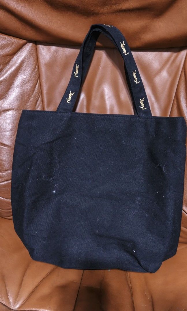 Ysl tote bag (Category: Luxury Bags & Wallets) located in Polomolok. Submitted by dkljapansurplus (Listing ID 1392260285, Image 2). Description: Ysl black canvas tote bag, Good condition from japan Freeshipping.