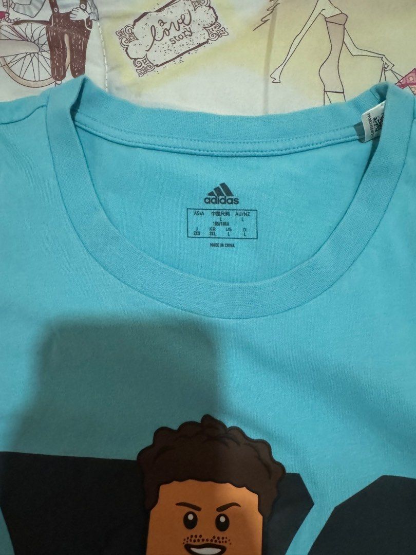 AUTHENTIC Adidas Lego Blue Tshirt LARGE (Category: Tshirts & Polo Shirts ) located in Malabon City. Submitted by solijustuff (Listing ID 1392372237, Image 2). Description: Like new!!! Actually almost brand new just no tags you can see the condition based on the photos :)) Willing to nego but not too much as this is for my Dog’s funds.