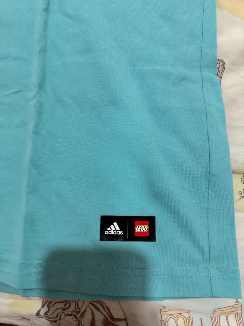 AUTHENTIC Adidas Lego Blue Tshirt LARGE (Category: Tshirts & Polo Shirts ) located in Malabon City. Submitted by solijustuff (Listing ID 1392372237, Image 3). Description: Like new!!! Actually almost brand new just no tags you can see the condition based on the photos :)) Willing to nego but not too much as this is for my Dog’s funds.