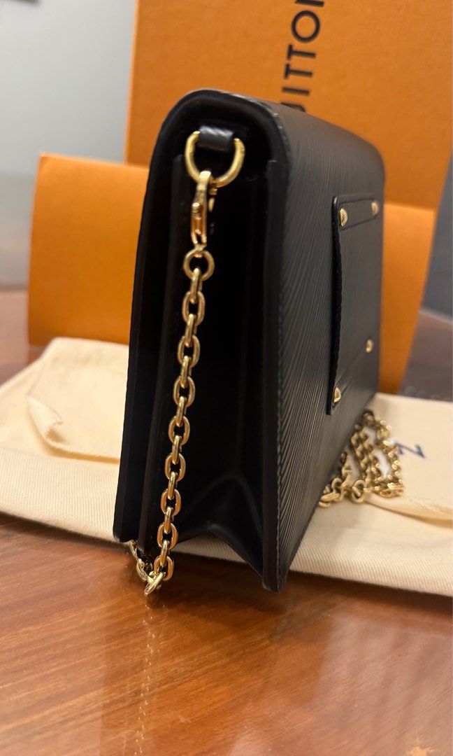 Authentic LV epi leather Twist Chain Wallet (Category: Luxury Bags & Wallets) located in Davao. Submitted by prelovedbyjmu (Listing ID 1392446966, Image 3). Description: 🖤Rarely used. Bought in 2023 🖤Microchipped 🖤 Nothing to explain, no flaw. 🖤 Will accept COP via LBC with dp for your peace of mind☺️ .