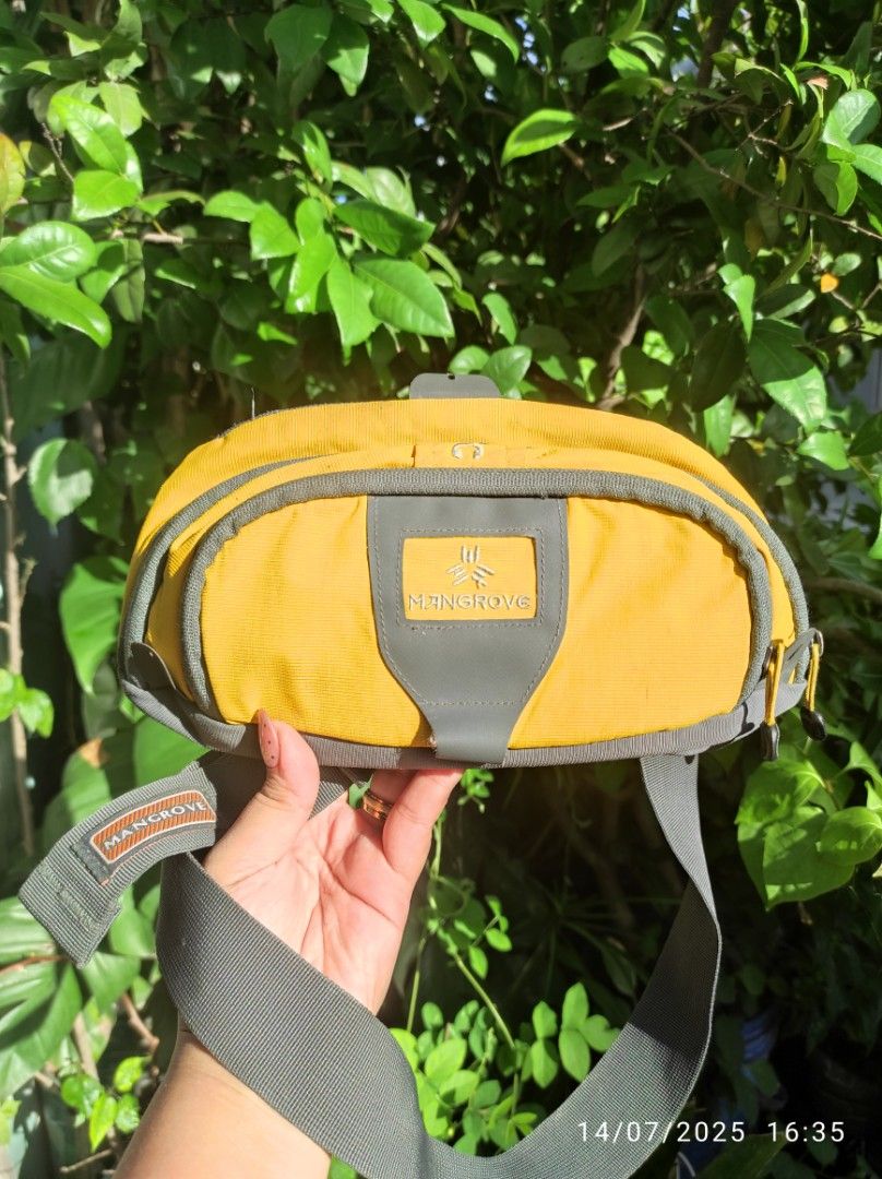 Belt bag - Mangrove brand - grey & yellow (Category: Belt bags, Clutches and Pouches) located in Cavite. Submitted by mrsjclaveria_ukaybags (Listing ID 1392310390, Image 1). Description: - needs wash only for hygiene purposes. no flaws. - can fit up to 40" waistline ✨ DM for details 𝗙𝗔𝗤𝗦: ALWAYS TAKE A CLEAR VIDEO OF ITEM BEFORE/DURING UNBOXING PARCEL/S 📦 — NO COD. (Strictly first to pay basis only). — All items are thrifted /preloved /ukay/