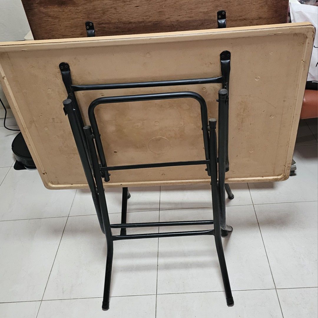 Foldable Table (Category: Tables & Sets) located in Singapore. Submitted by cathylst (Listing ID 1392335192, Image 1). Description: - 35inches x 24 inches - Foldable table - Beige tabletop - Black metal frame - Great for small spaces - Easy storage - Fully functional - Shows some wear and tear.