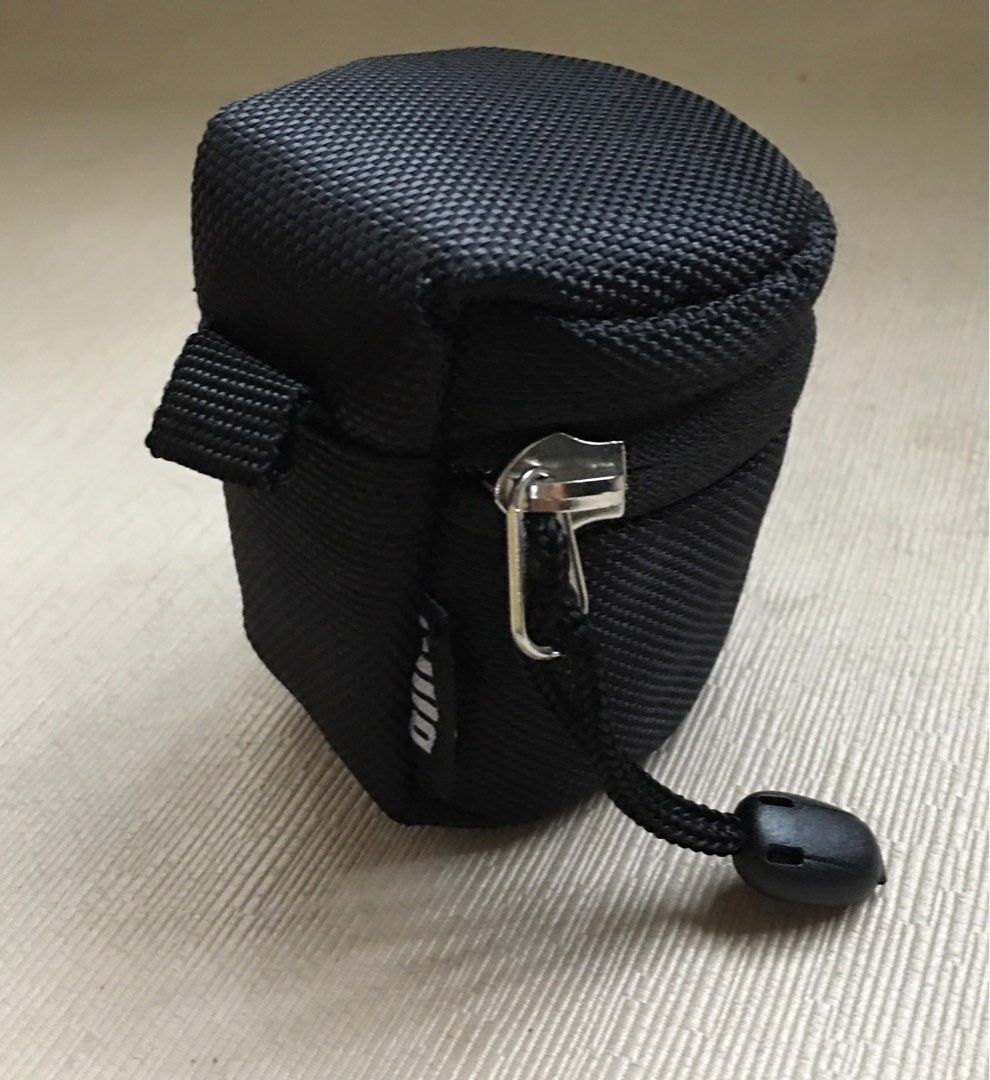 King Camera Lens Pouch (Category: Other Photography Accessories) located in Tarlac. Submitted by greatfindstrlc (Listing ID 1392385951, Image 2). Description: KING brand, black: color, size: Height: 7cm , Radius: 5cm.