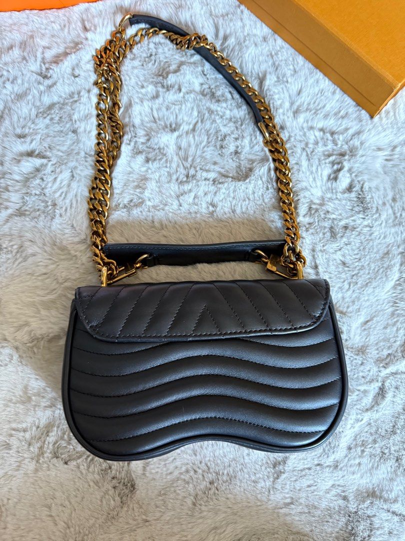 Lv New wave Small (Category: Luxury Bags & Wallets) located in Angono. Submitted by sam.sam15 (Listing ID 1392328938, Image 2). Description: Like new lv new wave small with dustbag and box.