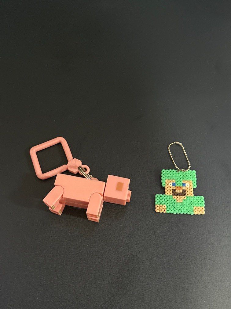 minecraft keychains (Category: Character Goods) located in Singapore. Submitted by groosrub (Listing ID 1392338438, Image 1). Description: minecraft keychains, 1 for $2, both for $3.