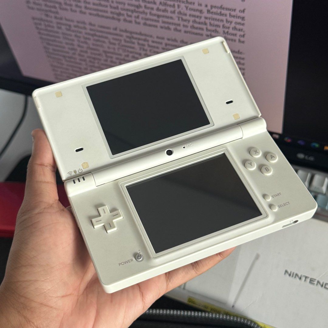 Nintendo DSi White (Category: Nintendo) located in Quezon City. Submitted by consoleciety (Listing ID 1392401671, Image 3). Description: Selling Nintendo DSi White Boxed 2GB ₱6,500 —unit is in excellent condition. very minimal scratches. just have to clean the outer cover to remove the light brownish tone. —no issue, fully working. —non-cfw/not jb/not modded. —includes carry case, 2 original nintendo styluses, 2GB SD, and AC adapter. +600 for 64g