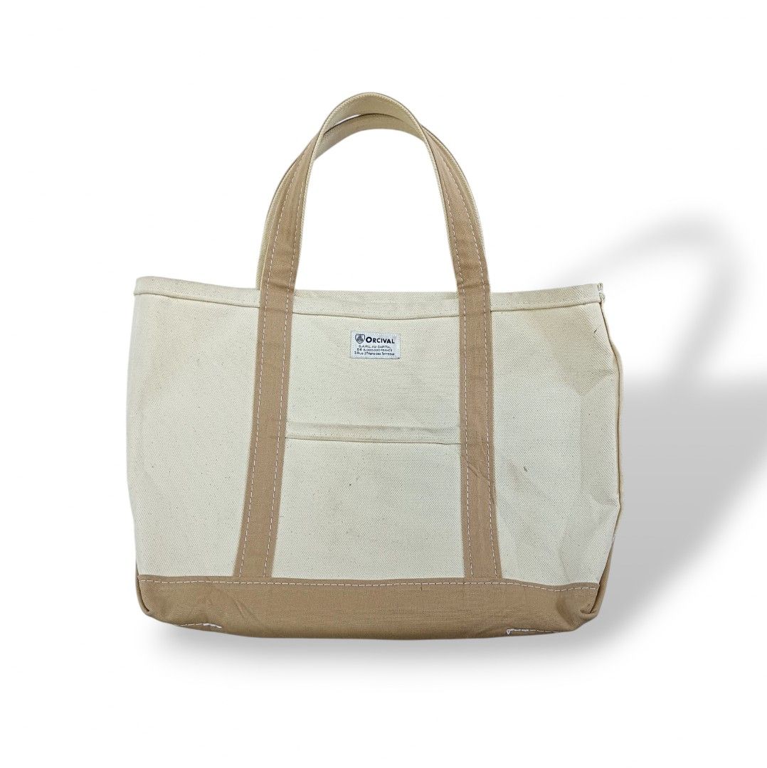 Orcival Japan Canvas Tote Bag (Category: Luxury Bags & Wallets) located in Davao. Submitted by jecks9 (Listing ID 1392368207, Image 2). Description: width: 14 inch length: 11 inch sides: 5 inch base: 5 inch verygood condition 9.5/10 colorate dirt/stain see photos for details still presentable to use MAKE OFFER 📌.