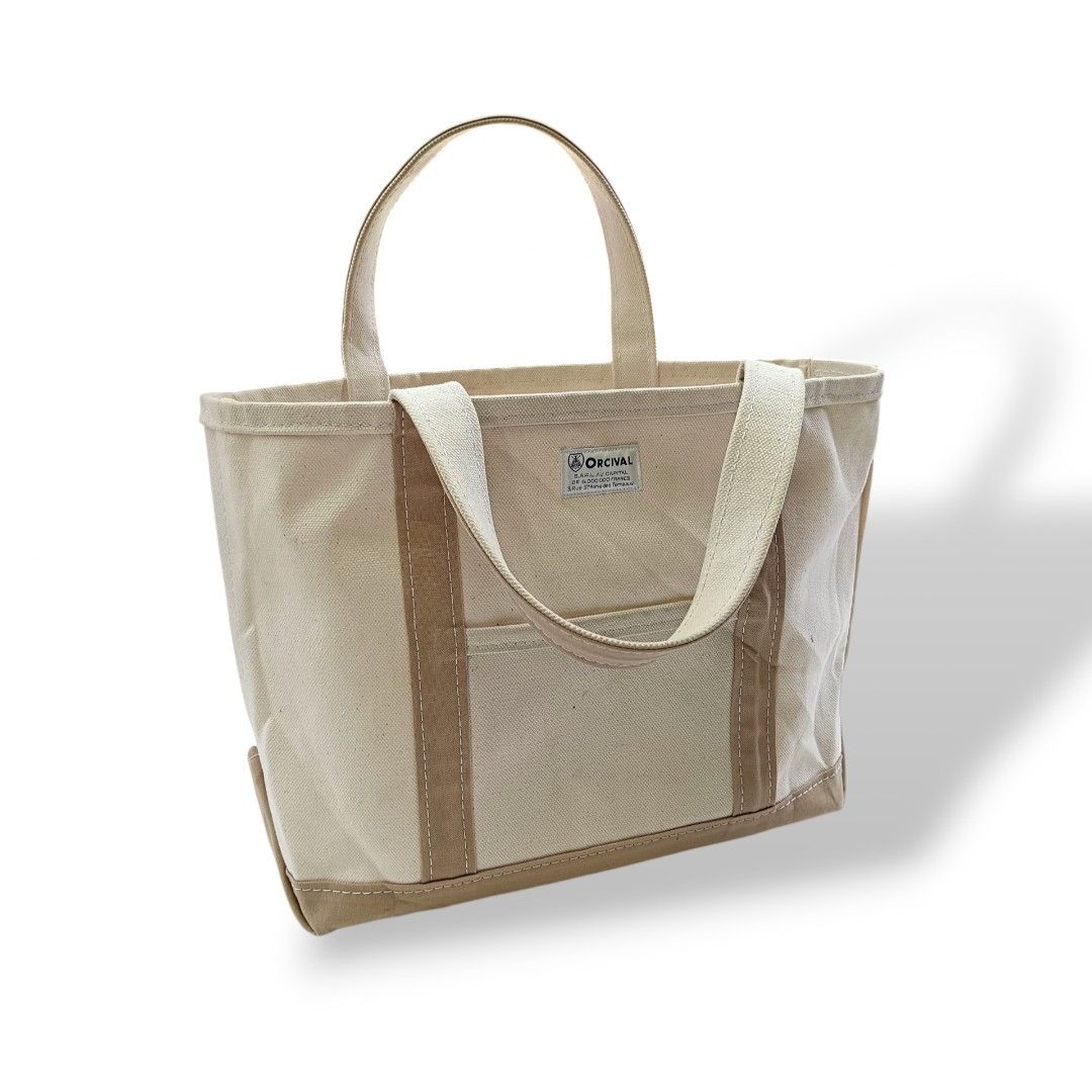 Orcival Japan Canvas Tote Bag (Category: Luxury Bags & Wallets) located in Davao. Submitted by jecks9 (Listing ID 1392368207, Image 1). Description: width: 14 inch length: 11 inch sides: 5 inch base: 5 inch verygood condition 9.5/10 colorate dirt/stain see photos for details still presentable to use MAKE OFFER 📌.