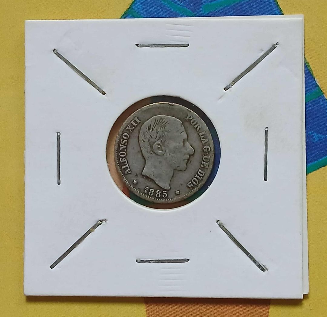 Philippines 10 Cents 1885 Silver Coin (Category: Currency) located in Quezon City. Submitted by allaboutcollectibles (Listing ID 1392306345, Image 3). Description: What you see is what you get. Composition: Silver (.835) Weight: 2.5 g Diameter: 18 mm This coin is guaranted genuine, thank you for visiting my store. .