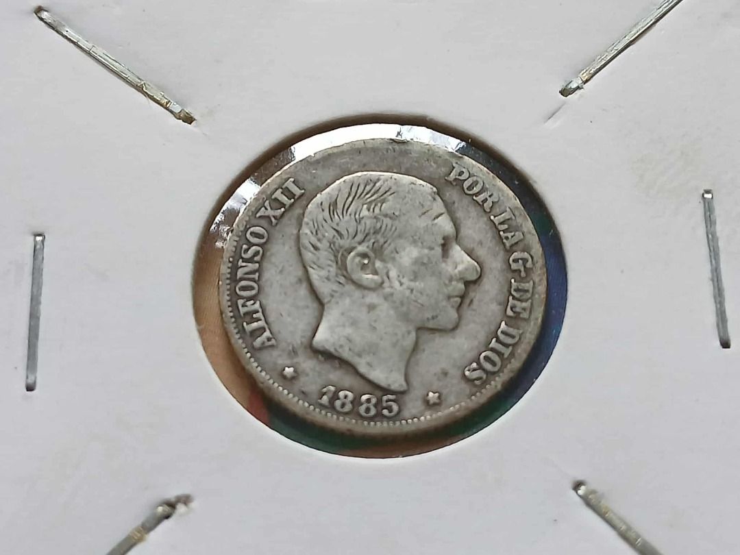 Philippines 10 Cents 1885 Silver Coin (Category: Currency) located in Quezon City. Submitted by allaboutcollectibles (Listing ID 1392306345, Image 2). Description: What you see is what you get. Composition: Silver (.835) Weight: 2.5 g Diameter: 18 mm This coin is guaranted genuine, thank you for visiting my store. .