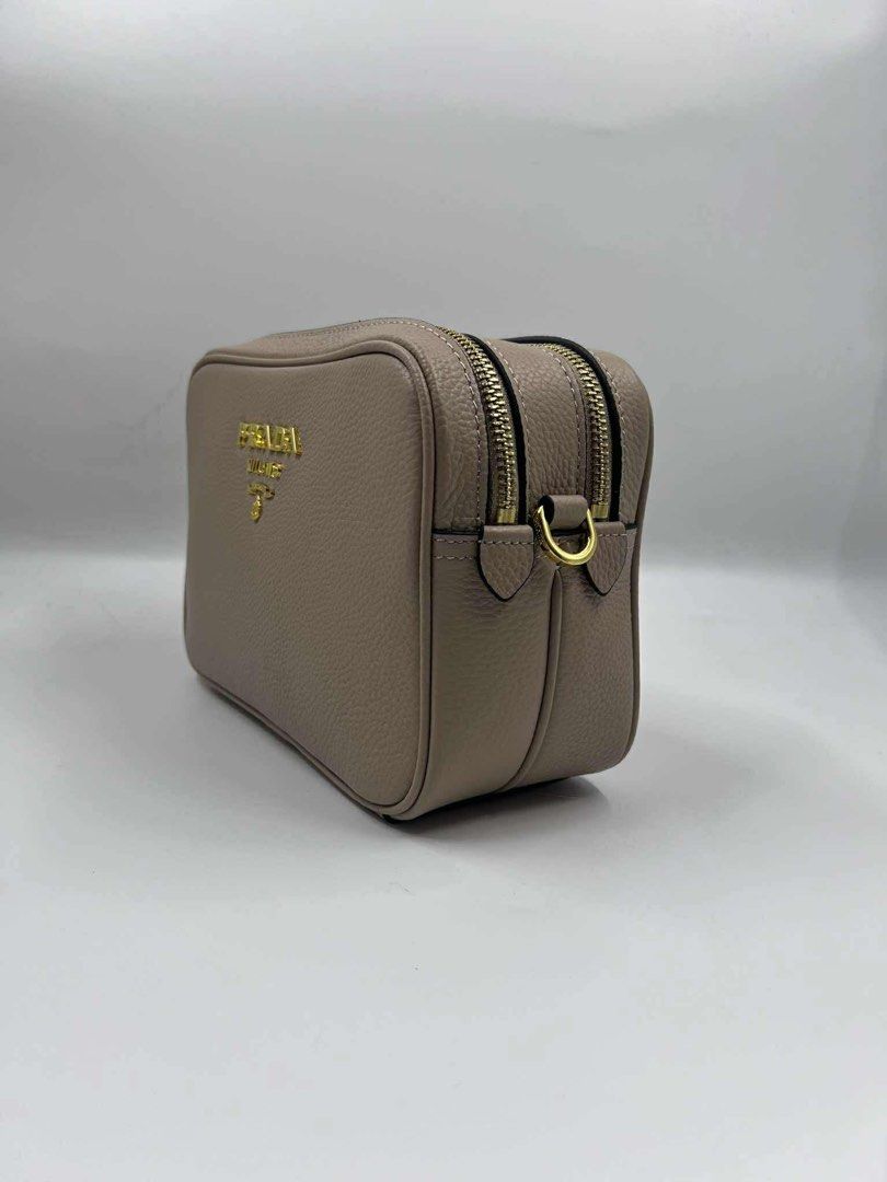 Prada Camera Bag (Category: Luxury Bags & Wallets) located in Malabon City. Submitted by truepenguin_22c2e4 (Listing ID 1392398088, Image 3). Description: 10x6inches Like new With dustbag.
