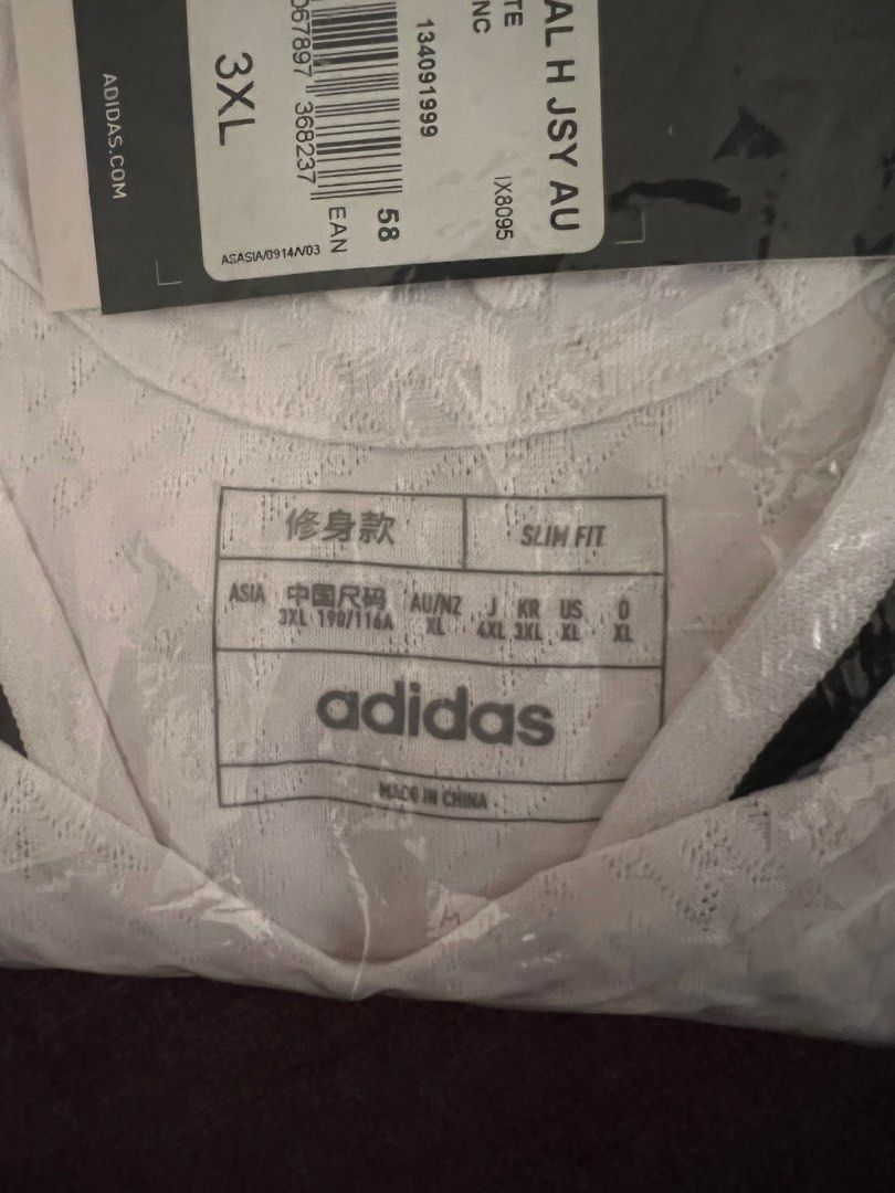 Real Madrid 24/25 Home Jersey (Category: Activewear) located in Singapore. Submitted by jidiem (Listing ID 1392372290, Image 3). Description: - Brand new Adidas Real Madrid jersey - Size: 3XL (US XL) - Authentic player version - Includes original tags and packaging RFS, clearing store. Never worn before. Slight nego for fast deal..