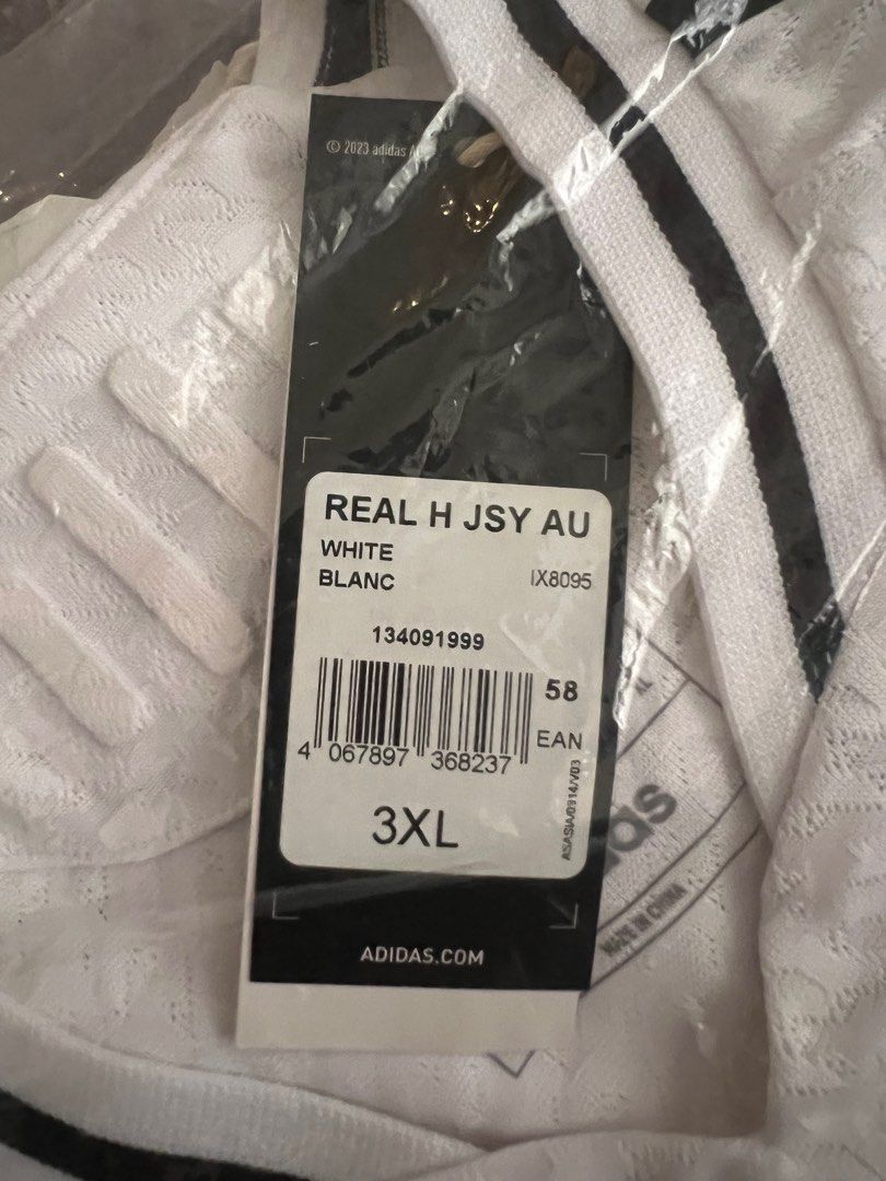 Real Madrid 24/25 Home Jersey (Category: Activewear) located in Singapore. Submitted by jidiem (Listing ID 1392372290, Image 1). Description: - Brand new Adidas Real Madrid jersey - Size: 3XL (US XL) - Authentic player version - Includes original tags and packaging RFS, clearing store. Never worn before. Slight nego for fast deal..