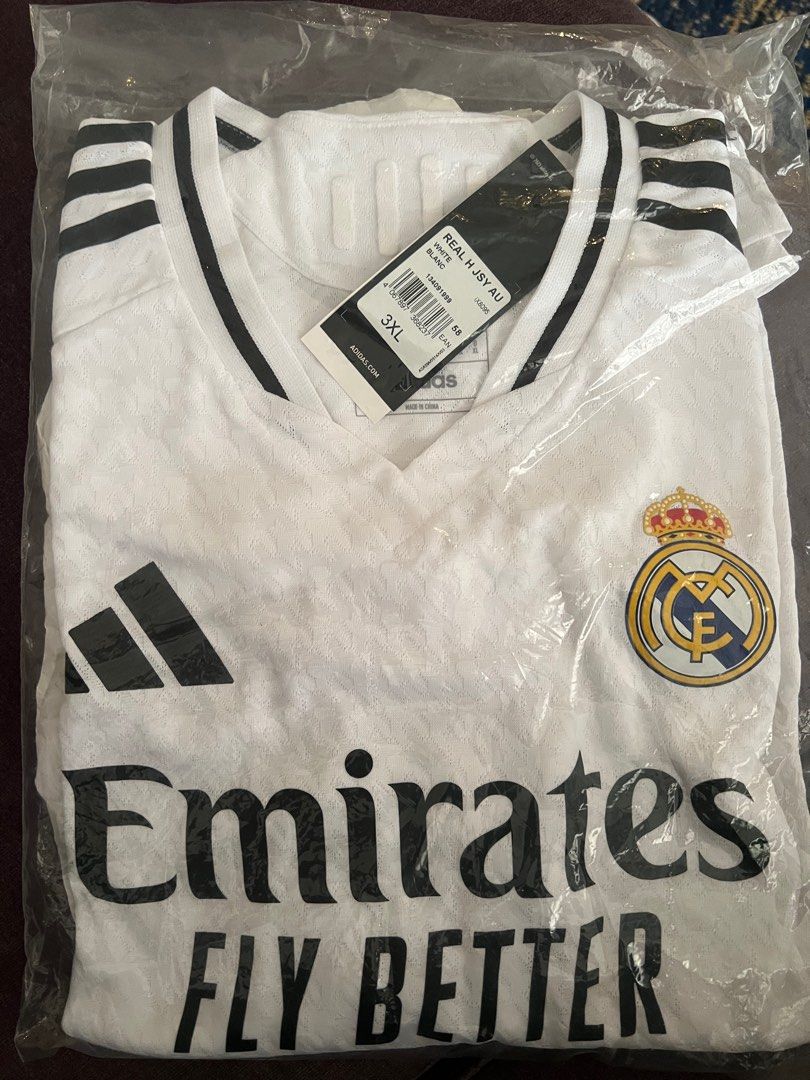 Real Madrid 24/25 Home Jersey (Category: Activewear) located in Singapore. Submitted by jidiem (Listing ID 1392372290, Image 2). Description: - Brand new Adidas Real Madrid jersey - Size: 3XL (US XL) - Authentic player version - Includes original tags and packaging RFS, clearing store. Never worn before. Slight nego for fast deal..