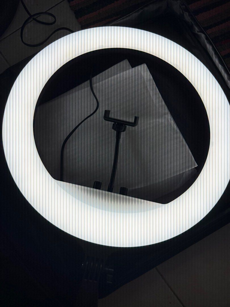 Ring Light with 2.1 meters Tripod (18inch / 45cm) (Category: Lighting & Studio Equipment) located in Quezon City. Submitted by beafinds (Listing ID 1392372439, Image 2). Description: - not used, only tested - complete items - different light settings - actual photo posted - bought for 2,100.