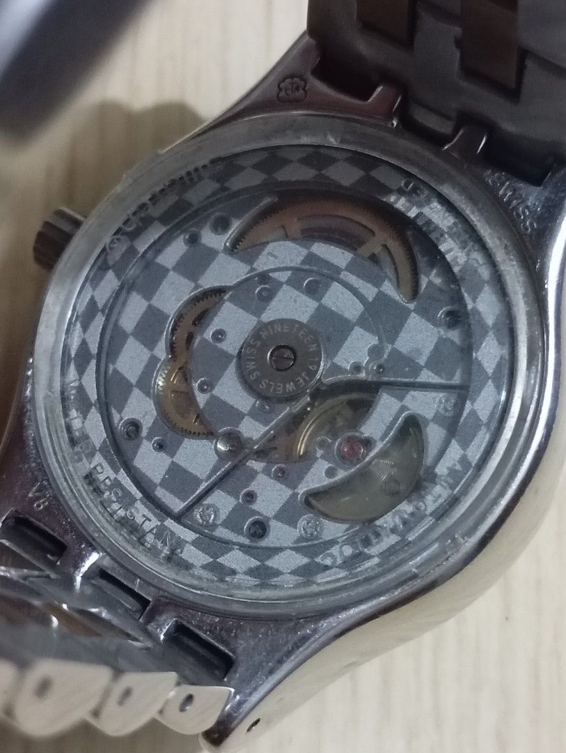 Swatch automatic sistem51 (Category: Men's Watches) located in Las Pinas. Submitted by quick_deals_great_finds2 (Listing ID 1392443952, Image 3). Description: Original good working condition 45mm large fits wrist 6.8 inches Fully functional keeps time.