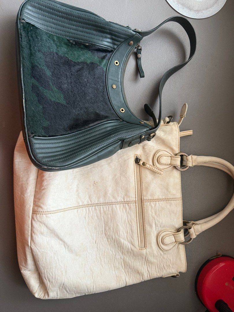 Anne Klein Medium Hobo and Creamy white Large Size Shoulder bag (Category: Shoulder Bags) located in Mercedes. Submitted by ddshoping238309 (Listing ID 1392495310, Image 2). Description: Get these 2 Anne Klein New York Leather bags free shipping (3 pounder pouch only ) Dark green medium hobo bag creamy White large No sling for the Creamy white bag Good used condition Malinis labas and loob. Normal signs of use Norma Wear and scratches at base of 