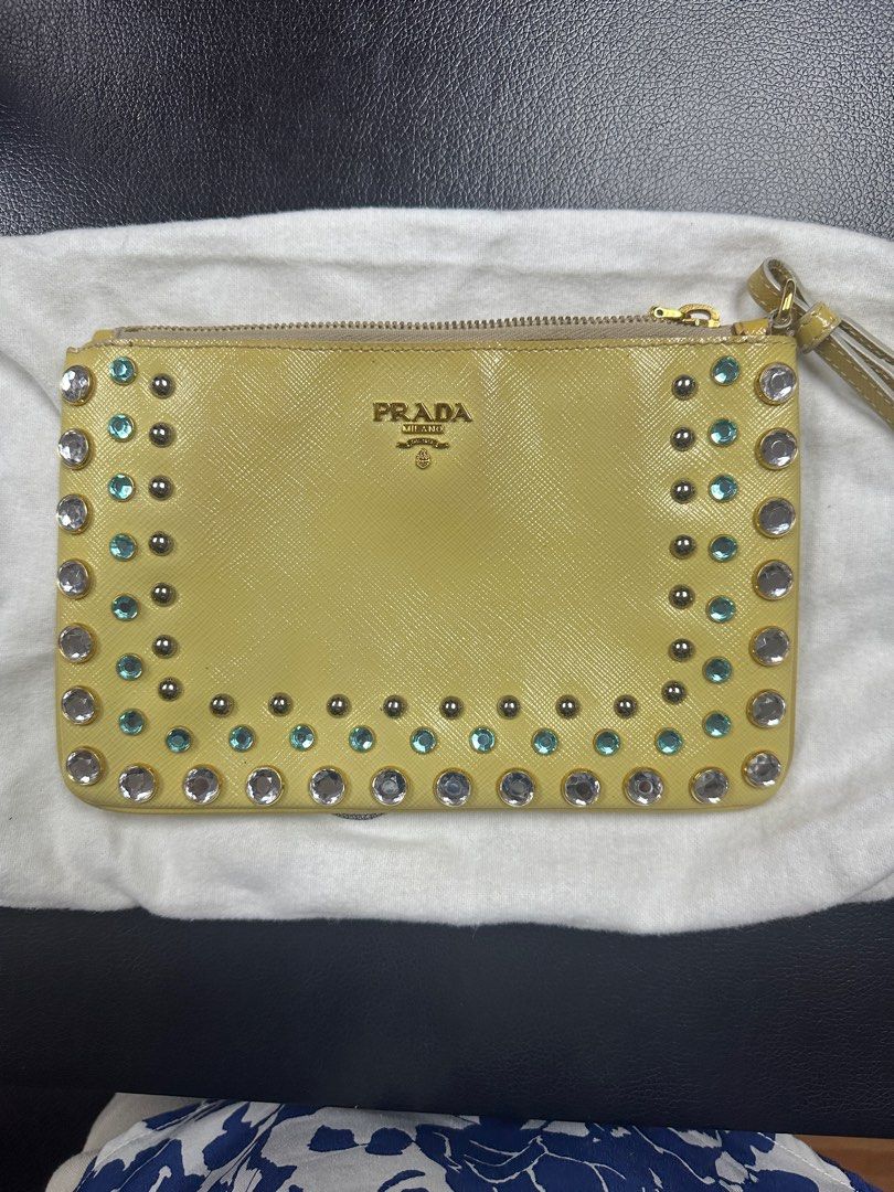 Authentic Prada wristlet (Category: Luxury Bags & Wallets) located in Manila. Submitted by authentic.holdalls_88 (Listing ID 1392547456, Image 1). Description: Guaranteed authentic qnd in mint condition .