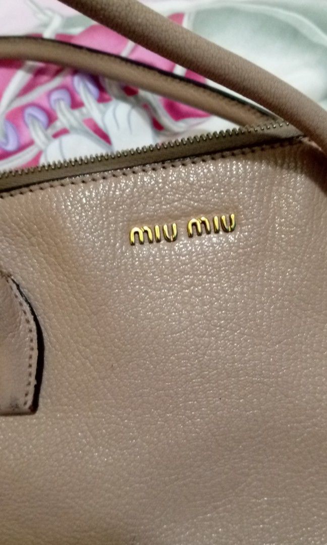 Bag (Category: Shoulder Bags) located in Singapore. Submitted by ericadalis47179 (Listing ID 1392659430, Image 3). Description: Miu Miu Authentic 💯 for no fussy buyer.
