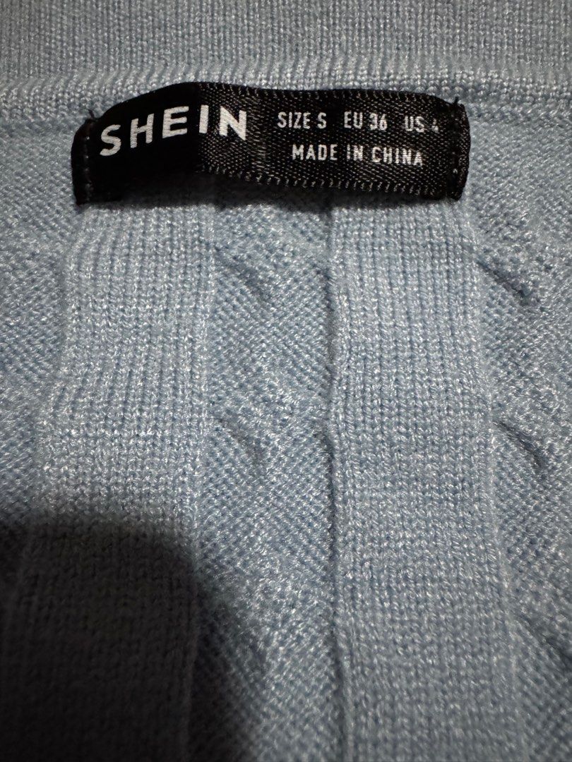 Basic Tops (Category: Blouses) located in Singapore. Submitted by petunialy99 (Listing ID 1392622338, Image 3). Description: Light blue cable knit top from Shein. Features a collared neckline and short sleeves. Size S. Perfect for a casual, stylish look. i bought the other top in Bangkok, only worn once! Size S Get both tops at $6 mailed .