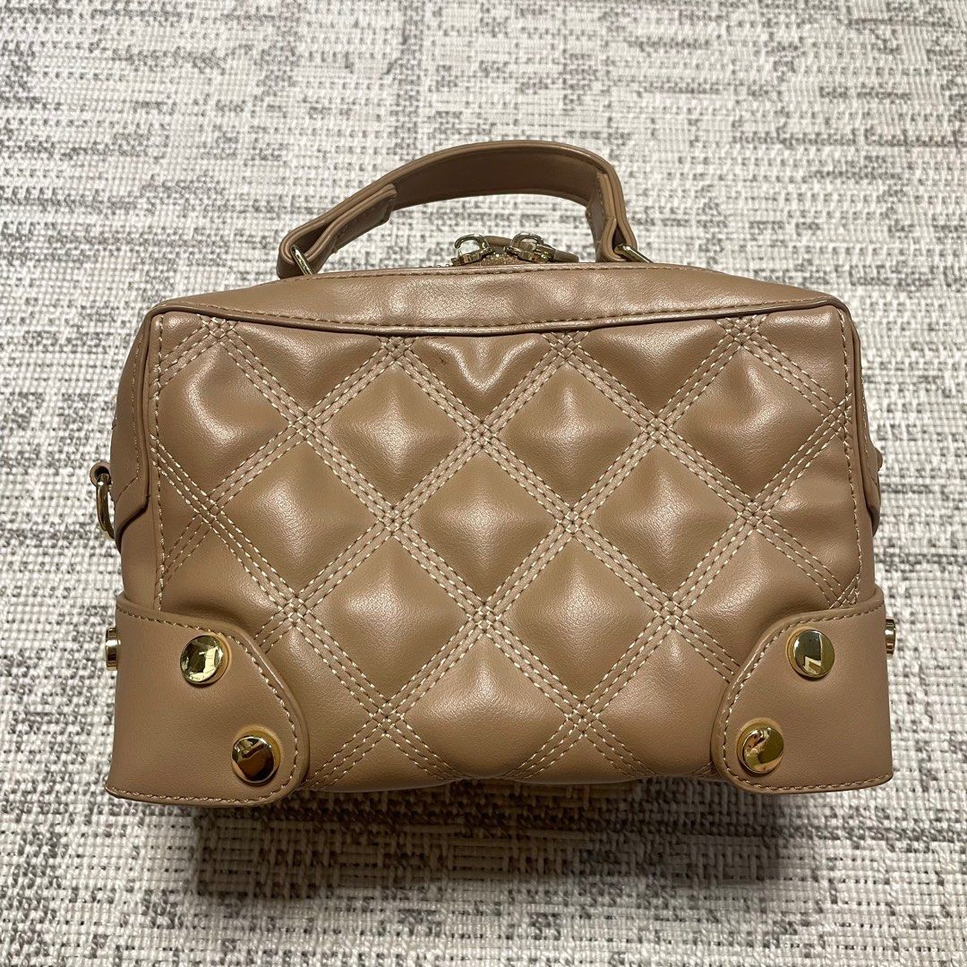 CLN Beige Quilted Design Bag (Category: Cross-body Bags) located in Marikina City. Submitted by icebear0821 (Listing ID 1392669498, Image 1). Description: - Lightly used - Have flaws but barely noticeable (refer to uploaded picture) .