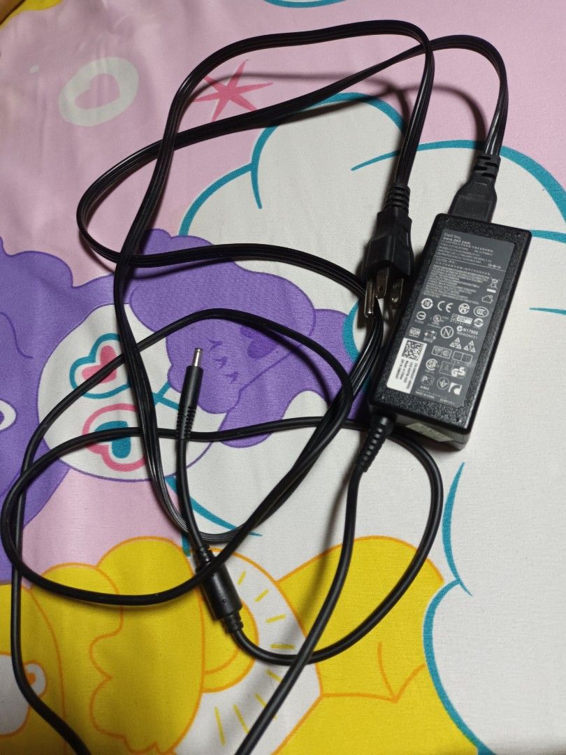 Dell Laptop Charger (Category: Laptops & Notebooks) located in Davao. Submitted by greendaylover (Listing ID 1392635865, Image 2). Description: Dell Laptop charger - 1500 pesos Model: FA065LS1-01 INPUT: 100-240V-50-60Hz 1.7A OUTPUT: 19.5V-3.34A Bought from a reputable computer store. FREE SHIPPING RFS: Spare charger.