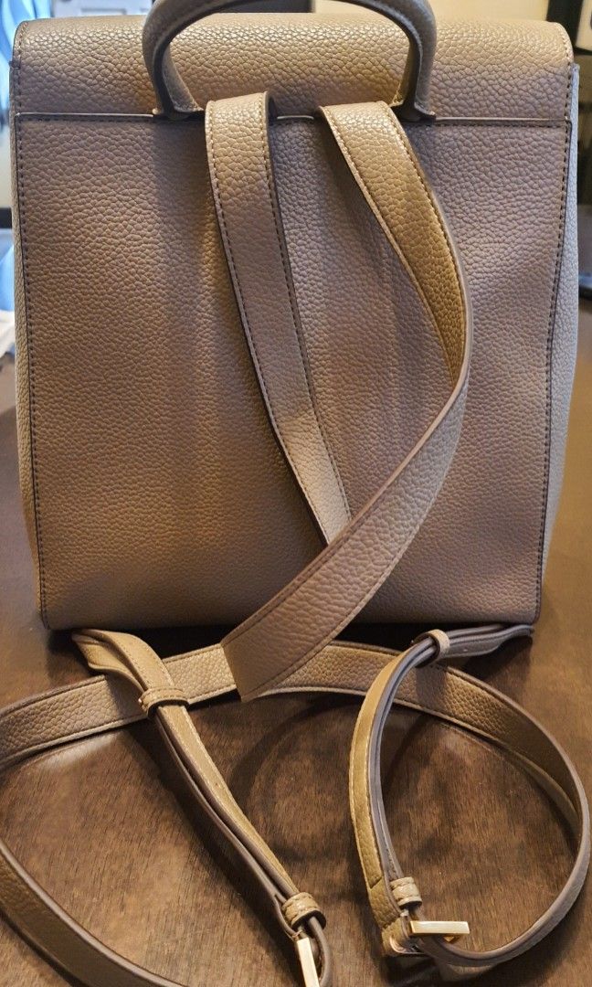 DKNY Backpack (Category: Luxury Bags & Wallets) located in Malolos. Submitted by aonf1 (Listing ID 1392491395, Image 2). Description: authentic DKNY convertible backpack thick removable straps and chains can be carried by hand, worn on shoulder, or as crossbody.