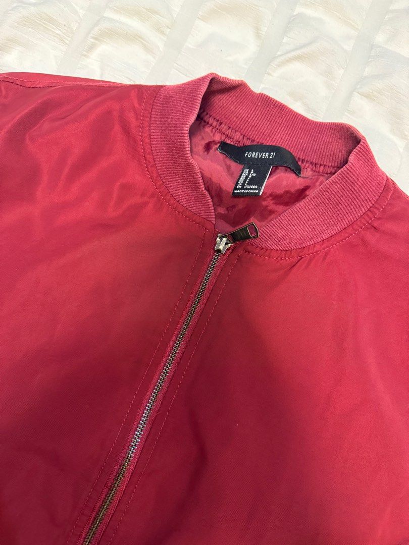 Forever 21 Bomber Jacket (Category: Coats, Jackets and Outerwear) located in Candelaria. Submitted by lainey_ (Listing ID 1392622740, Image 2). Description: F21 Bomber Jacket Size L, but fits M perfectly Good condish Selling for only 390.
