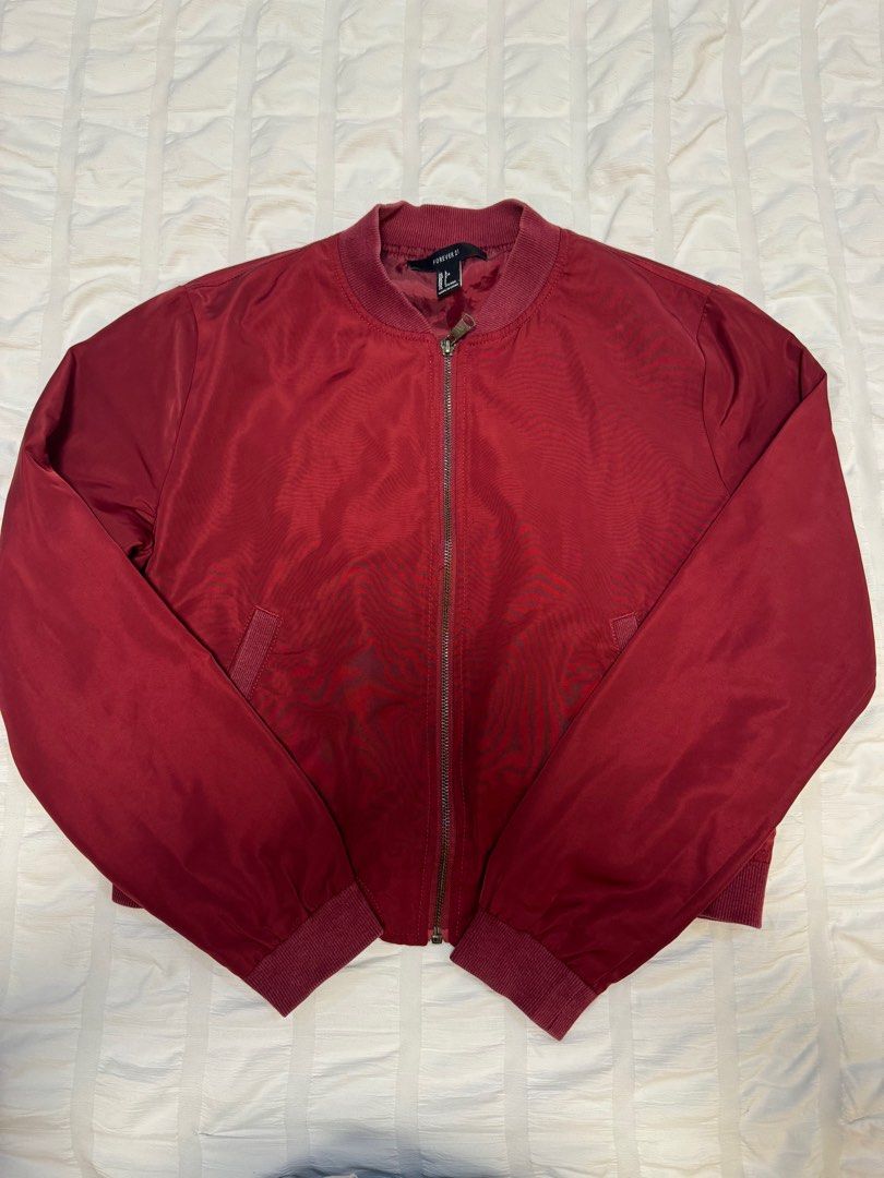 Forever 21 Bomber Jacket (Category: Coats, Jackets and Outerwear) located in Candelaria. Submitted by lainey_ (Listing ID 1392622740, Image 1). Description: F21 Bomber Jacket Size L, but fits M perfectly Good condish Selling for only 390.
