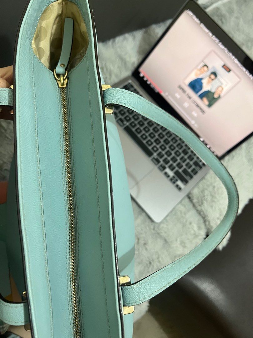 Kate spade Bag (Category: Luxury Bags & Wallets) located in Pasig City. Submitted by loysterr (Listing ID 1392575498, Image 3). Description: Original Kate Spade Tote Bag Light blue powder in color, Beige interior, Zipper and two inner pockets, Few slight imperfections as noted in photos Shoulder Strap Drop: 9.25" Height: 9.75" Width: 17.5" Depth: 6.25" payment via bank transfer first to pay will get the item sf c/o the buyer mod via lalamove/lbc 