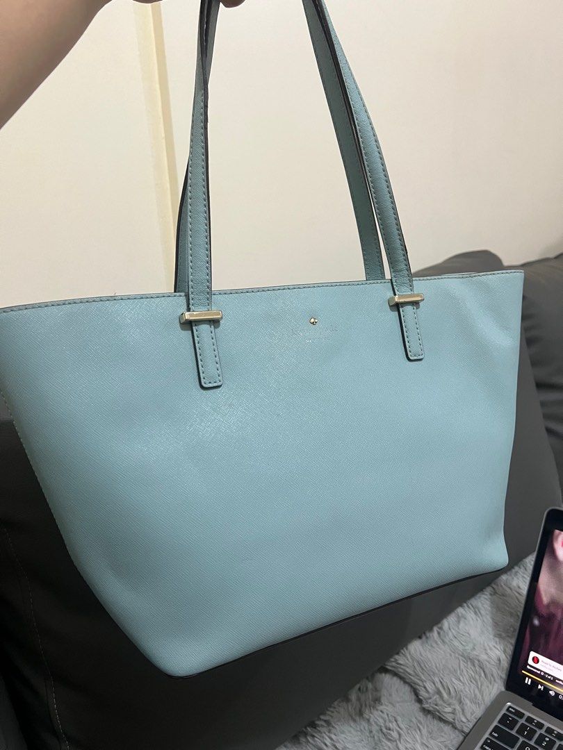 Kate spade Bag (Category: Luxury Bags & Wallets) located in Pasig City. Submitted by loysterr (Listing ID 1392575498, Image 1). Description: Original Kate Spade Tote Bag Light blue powder in color, Beige interior, Zipper and two inner pockets, Few slight imperfections as noted in photos Shoulder Strap Drop: 9.25" Height: 9.75" Width: 17.5" Depth: 6.25" payment via bank transfer first to pay will get the item sf c/o the buyer mod via lalamove/lbc 