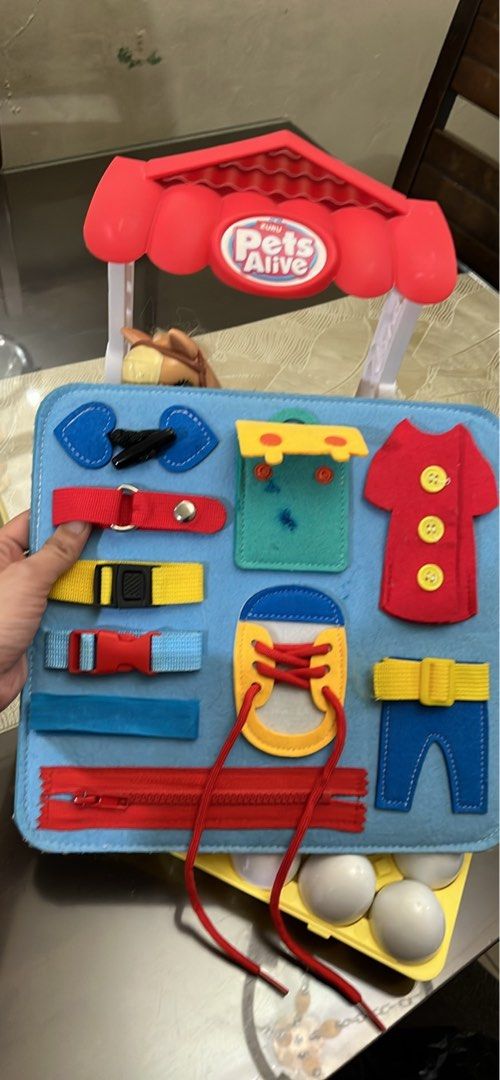 Kids toys (Category: Kids Toys) located in Manila. Submitted by heartprints (Listing ID 1392595343, Image 1). Description: Zuru pets alive 250 not sure if still working with battery rapunzel pull along wooden toy 250 busy felt board 100 matching egg toy 100 (missing match no. 1).