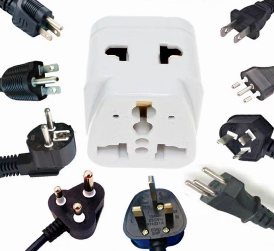 Mini Universal Plug Adapter (Category: Other Home Appliances) located in Singapore. Submitted by badge_yourself (Listing ID 1392638310, Image 2). Description: The Most compact and portable universal plugug you can find on the market! Super tiny and easy to carry! 2 for $18.