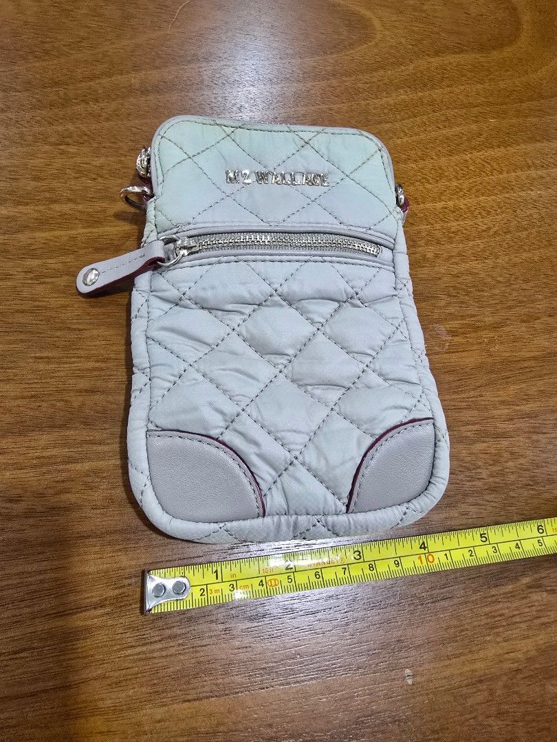 MZ WALLACE Crosby Micro Quilted Crossbody (Category: Cross-body Bags) located in Manila. Submitted by misstoomanythings (Listing ID 1392533996, Image 2). Description: Top zip closure With chain shoulder strap and adjustable crossbody strap 1 outside zip pocket 3 inside card slots MZ Wallace's signature nylon with leather trim.