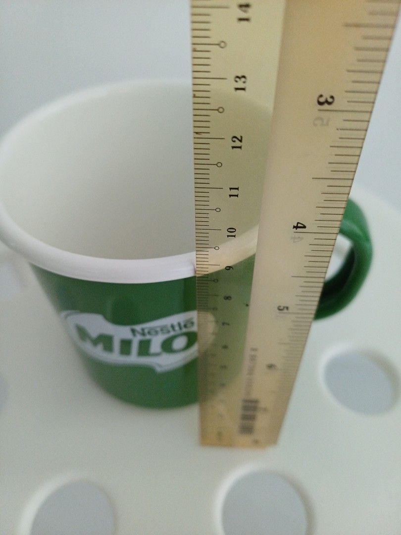 Nestle Milo Mug - Green (Category: Coffee & Tea Tableware) located in Singapore. Submitted by cdawh (Listing ID 1392550359, Image 2). Description: - Nestle Milo mug - Green exterior - White interior - Approximately 8cm in diameter and 9cm in height - Perfect for Milo - Free doorstep delivery for address within 15-minute walk from Canberra, Sembawang or Yishun MRT .